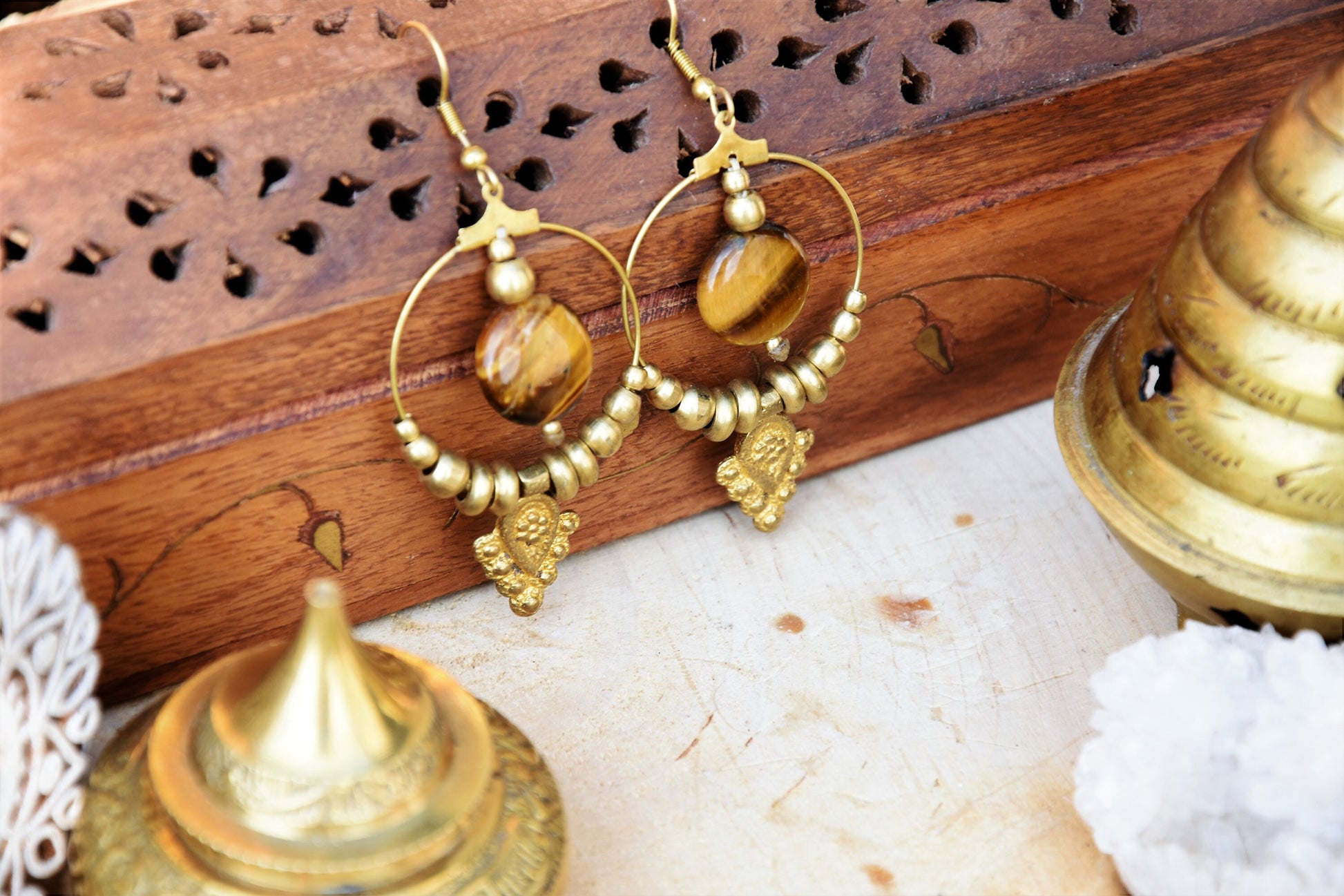 Golden brass Tiger eye earrings with tribal charm