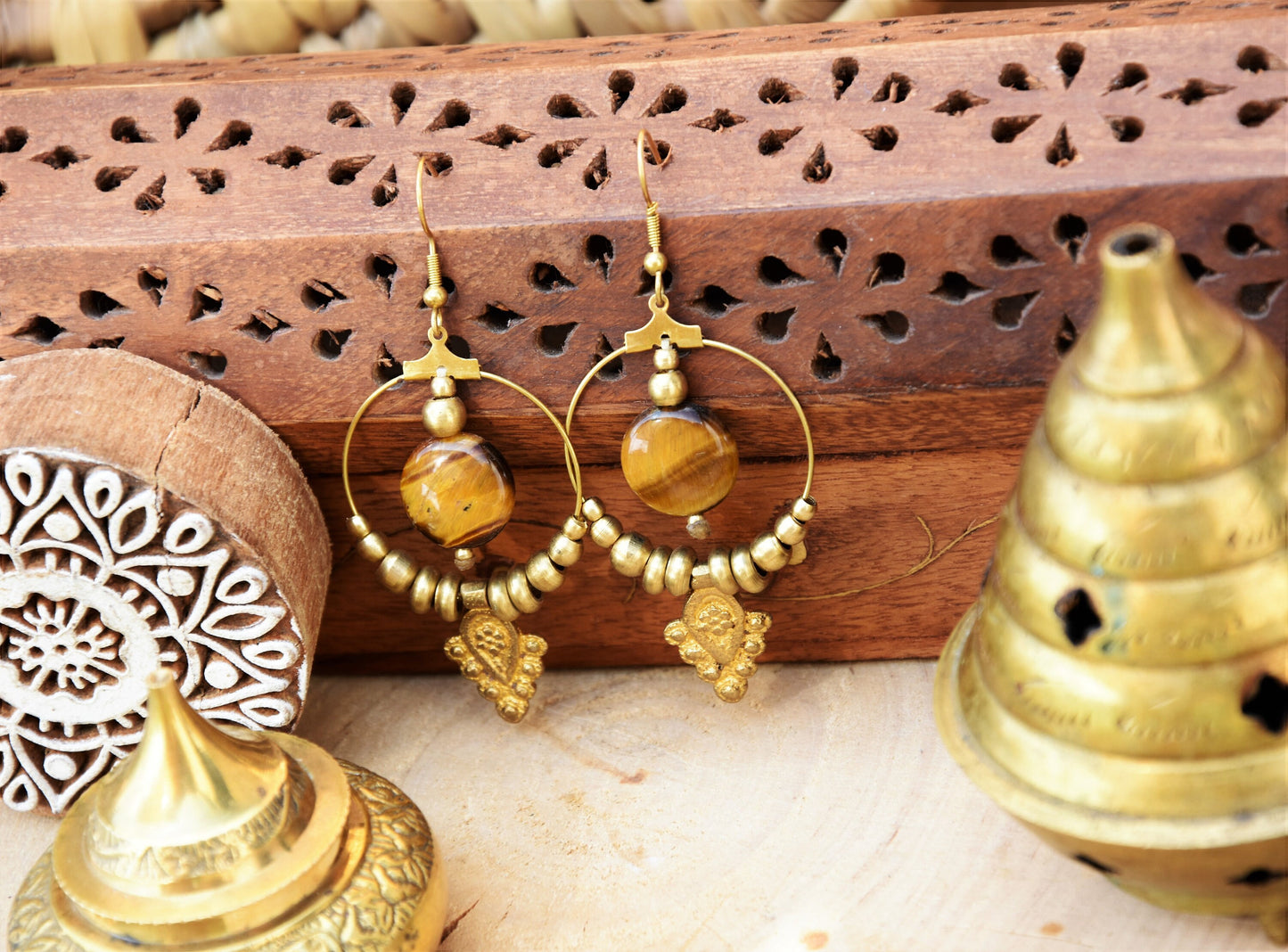 Golden brass Tiger eye earrings with tribal charm