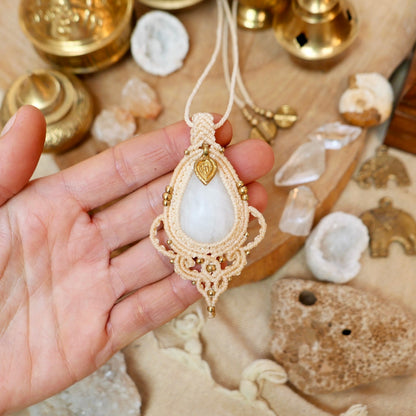 Bohemian macrame pendant with white quartz and brass charm