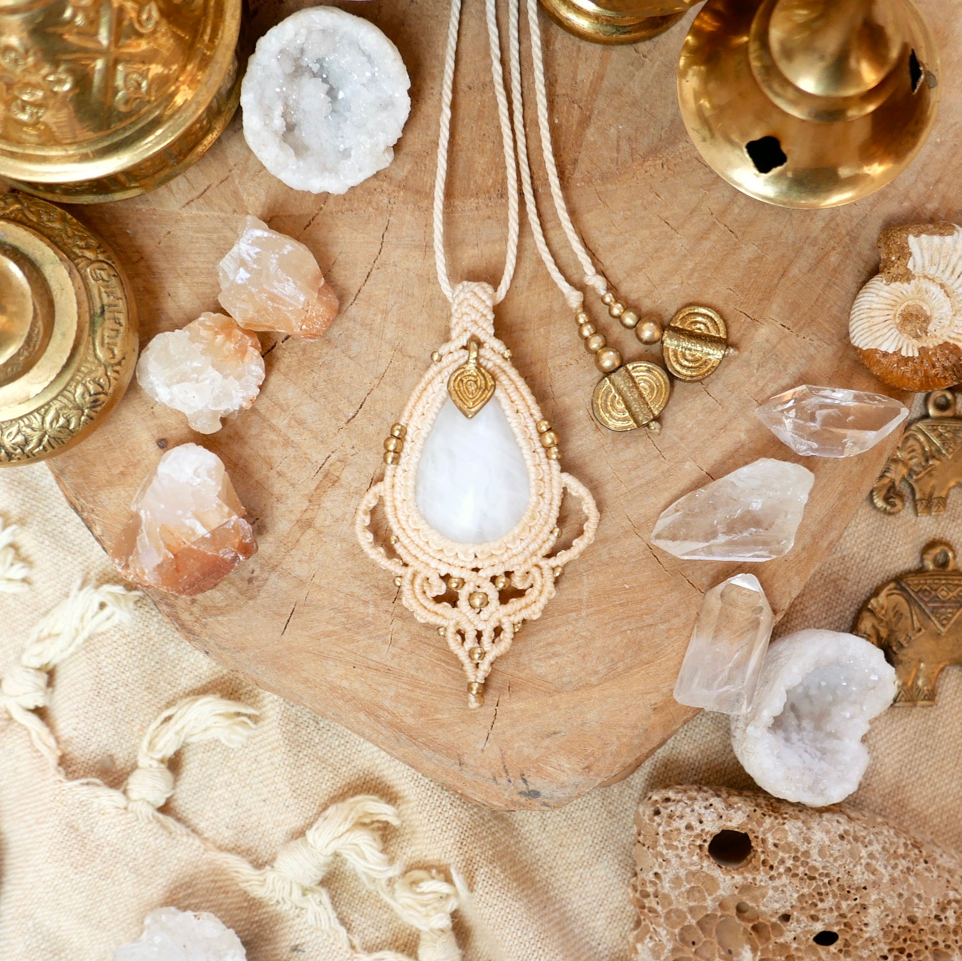 Bohemian macrame pendant with white quartz and brass charm