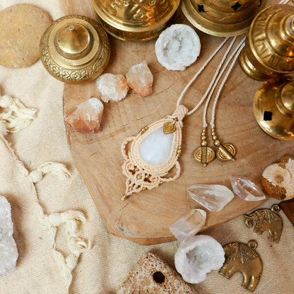 Bohemian macrame pendant with white quartz and brass charm