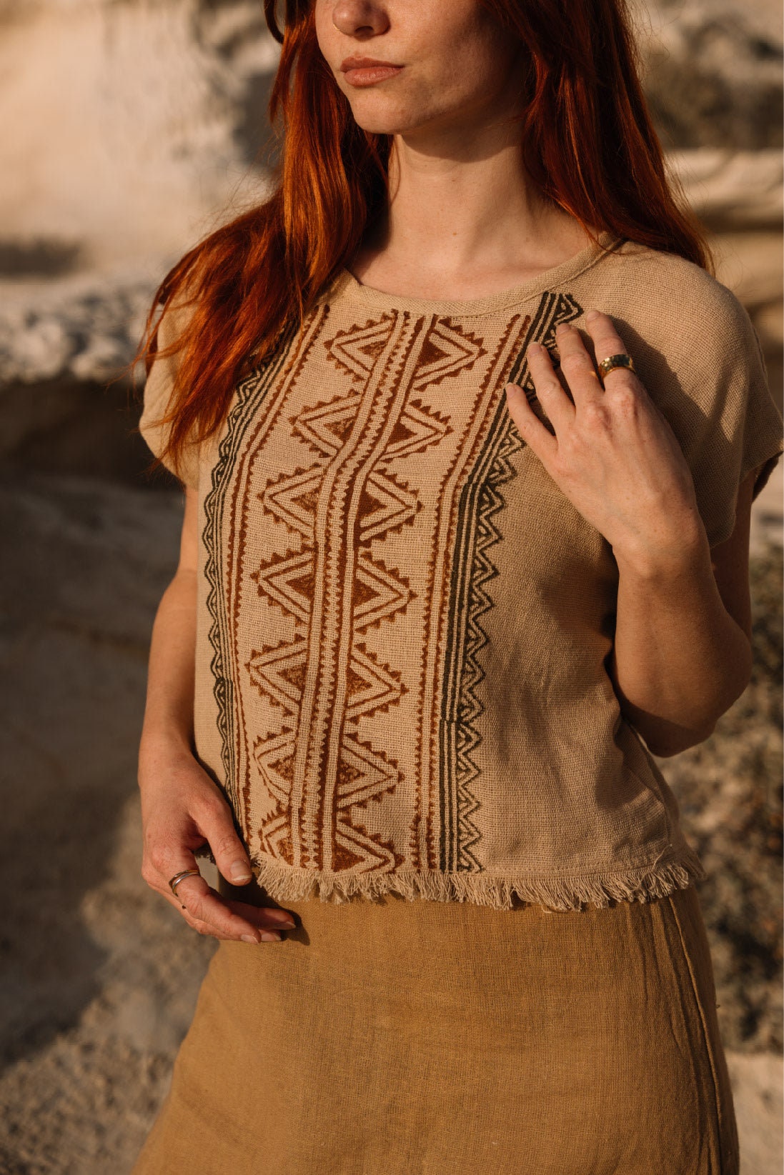 tribal top with fringed edges and ethnic print in colour beige