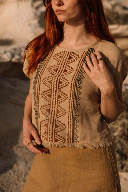 tribal top with fringed edges and ethnic print in colour beige