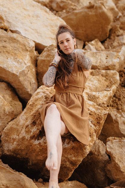 Brown tribal summer dress with rustic fringed edges and open back