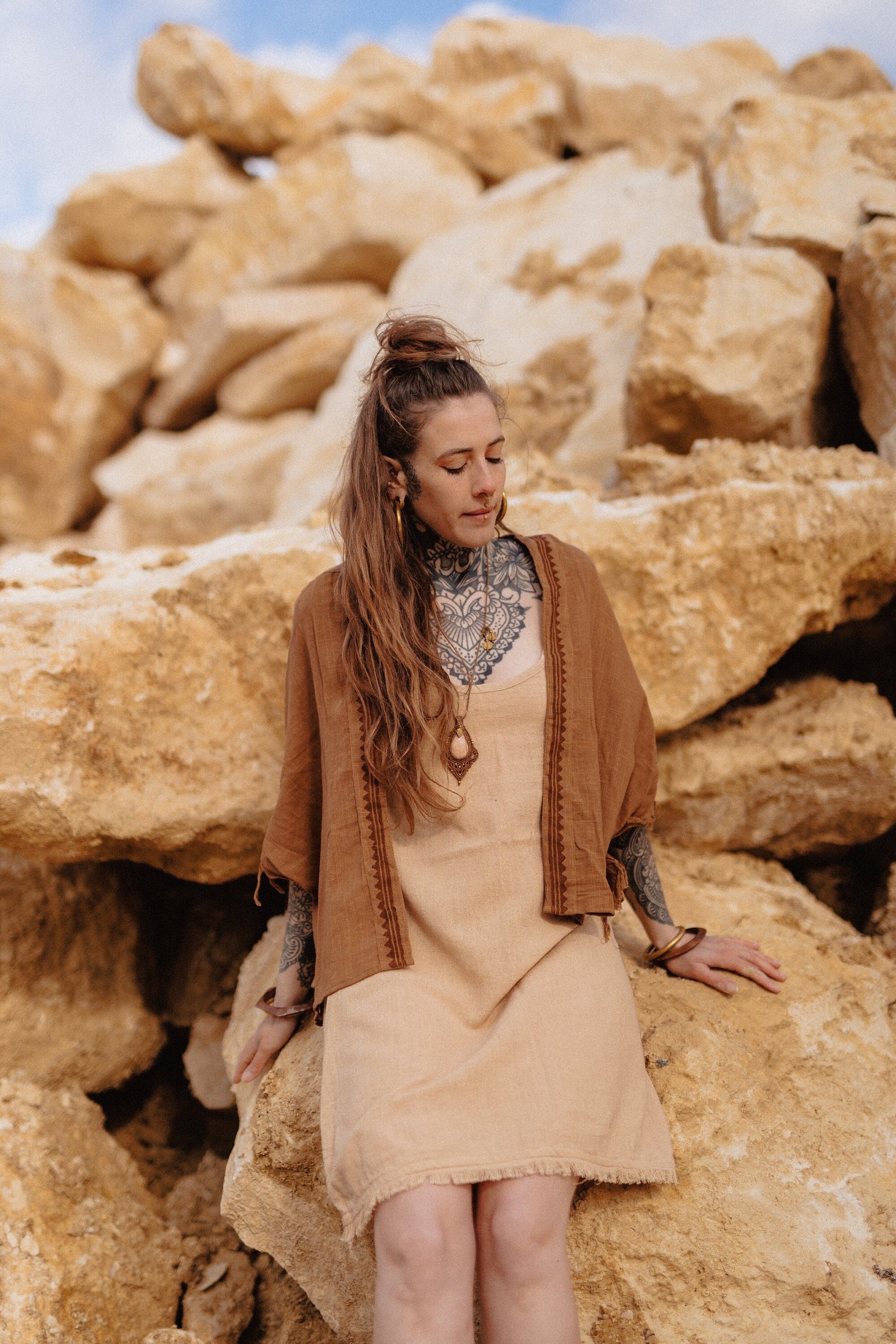 brown kimono with block print and fringed edges